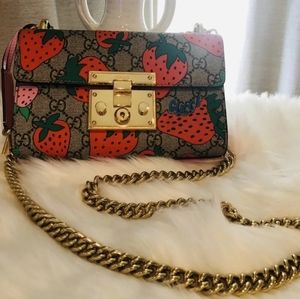 Gucci strawberry padlock shoulder bag.